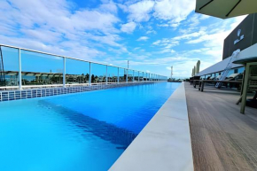 Flat aconchegante com piscina ampla